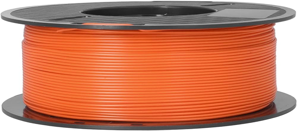Une bobine noire remplie de filament orange